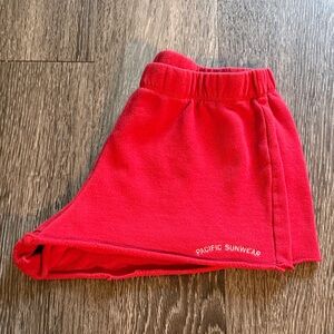 Pacific Sunwear (PacSun) red cotton shorts.
